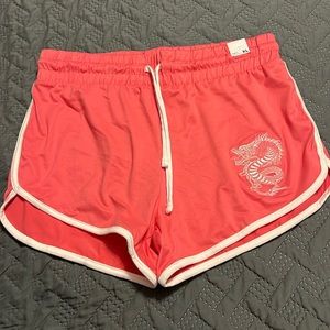 NWT Rue 21 pink shorts with drawstring. Dragon decal. XL